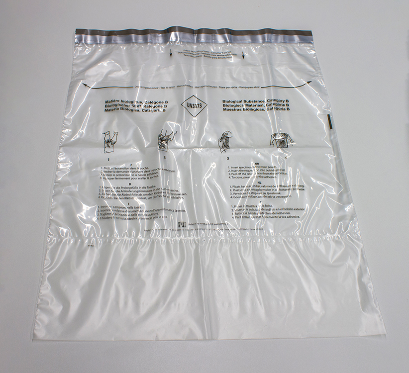 Safety bag 385x465mm, transparent +bande adhesif +avec encoches latérals, imprimé UN3373, personalisé MLS, avec poche